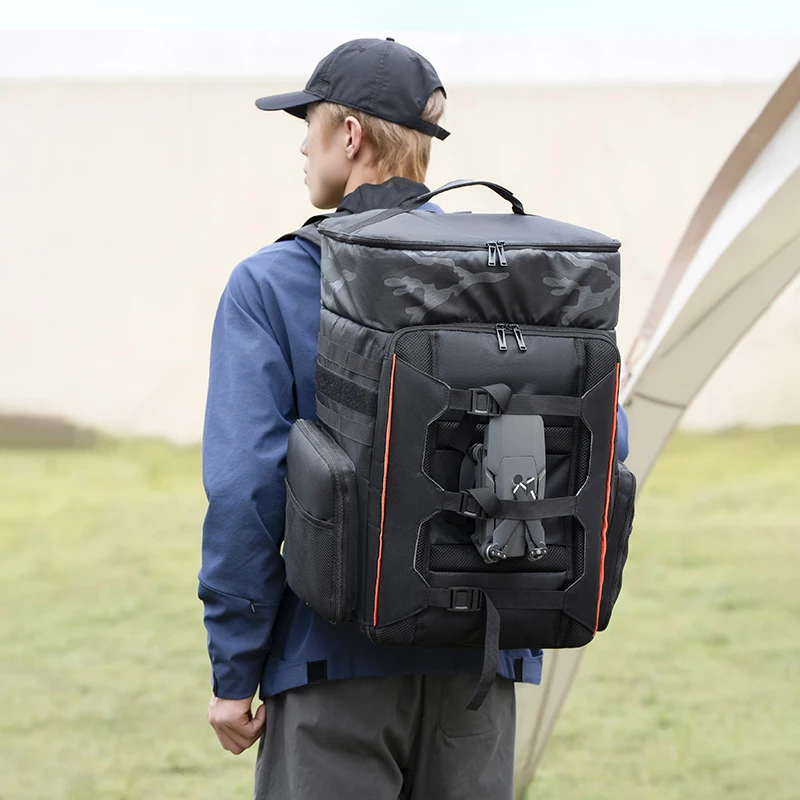 Sac à dos de transport étanche 40L ouvert montrant l'intérieur spacieux, parfait pour voyage et outdoor.