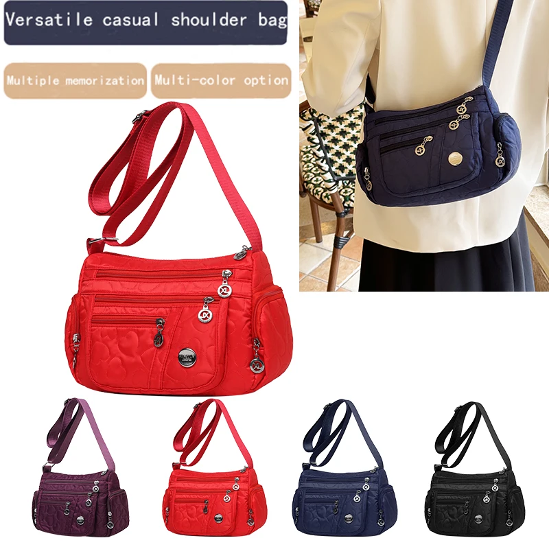 Schicke, verzierte Damen-Umhängetasche für den täglichen Pendelverkehr. Stilvolle, leichte, lässige Nylontasche mit Herzdetail und mehreren Taschen