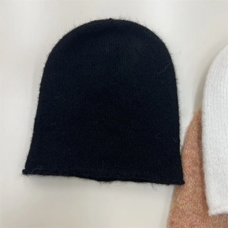 Japanese wool yarn knitted pile cap women's autumn and winter new fashionable warm ear protection head cap