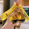 Netizens can reach duck keychains with oil floating cartoon figurine keychains, quicksand bottle pendants 2