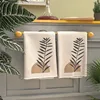 2 soft towels with abstract art plant patterns, stylish beige and black leaf designs, suitable for kitchens, bathrooms, or gyms 1