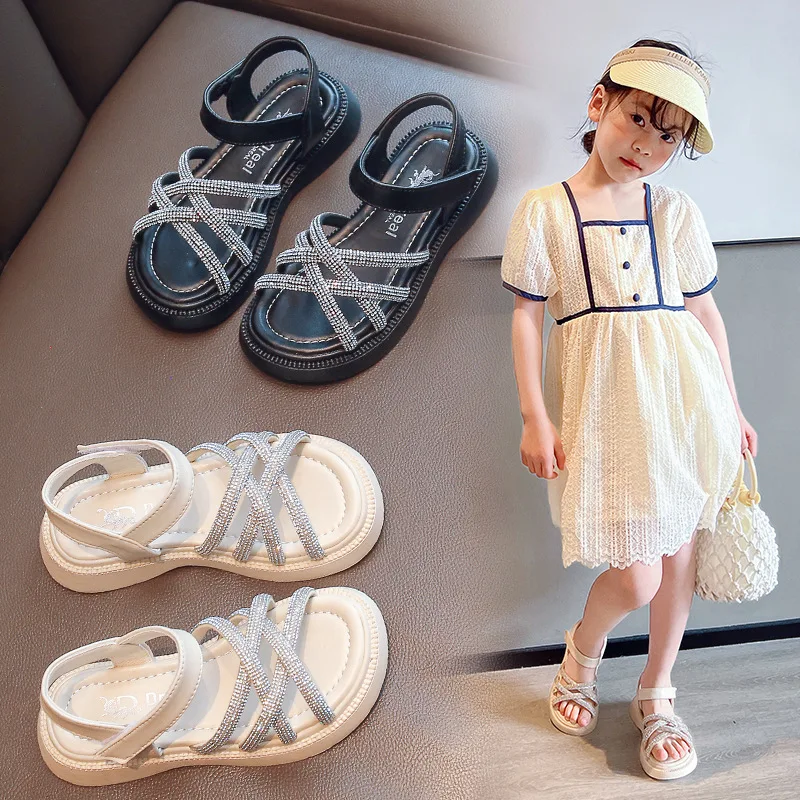 

Girls Sandals 2023 Summer New Children's Thin Strip Rhinestone Roman Shoes Kids Princess Open-toe Girls Beach Shoes Flat Sandals