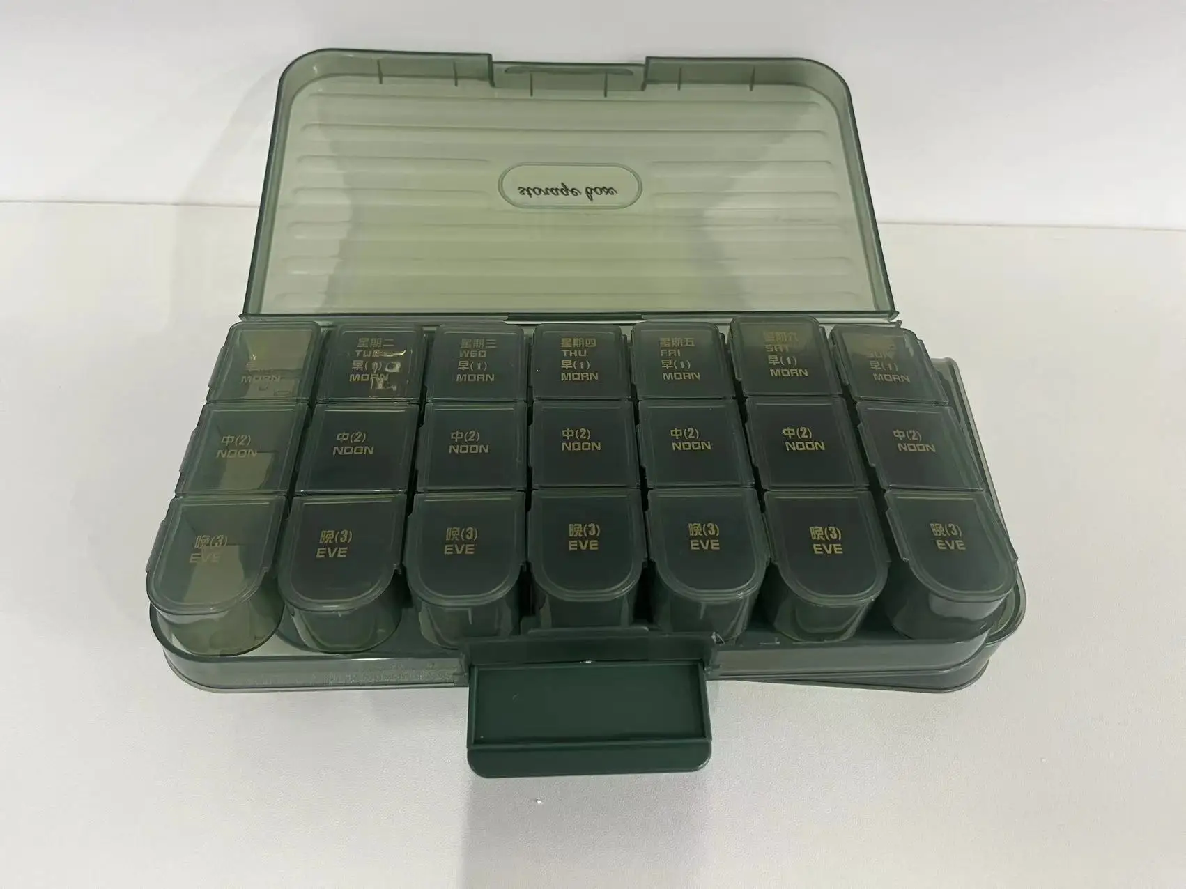 Multi color medicine box, portable for 7 days per week, with 21 compartments and 28 compartments for storage. Multi compartment