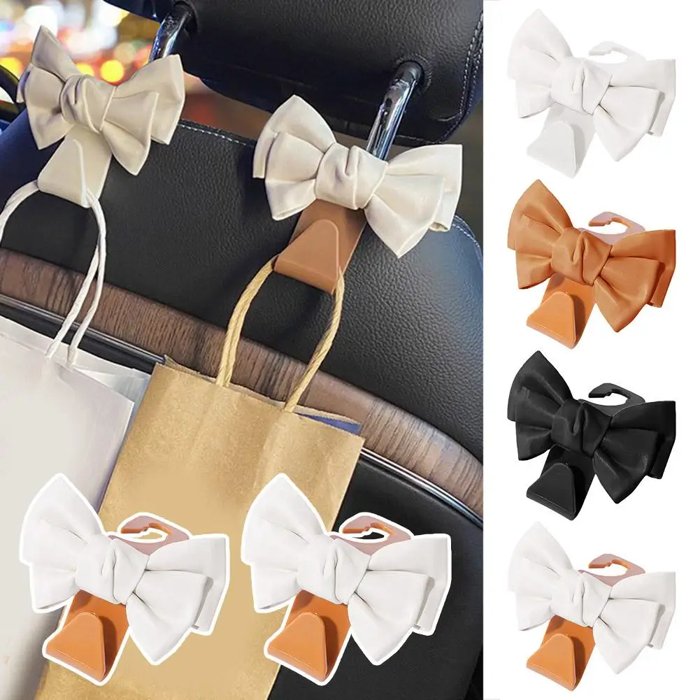 

2PCS PU Leather Bowknot Seat Back Storage Hooks Handbags Auto Universal Groceries Clips Accessories Car Holder Fastener W2W6