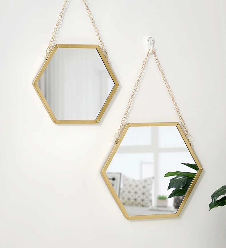 Miroir hexagonal en métal doré style nordique