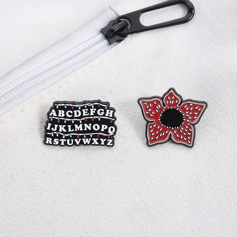 Sci-fi Horror Movies Brooch Enamel Pins Red Cannibal Flowers And 26 English Letter Brooches Backpack Lapel Badge Jewelry Gifts Image 6