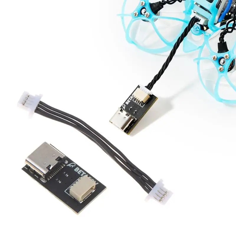 Support de batterie pour drone en plastique et métal, noir, montrant la structure métallique et les fixations.