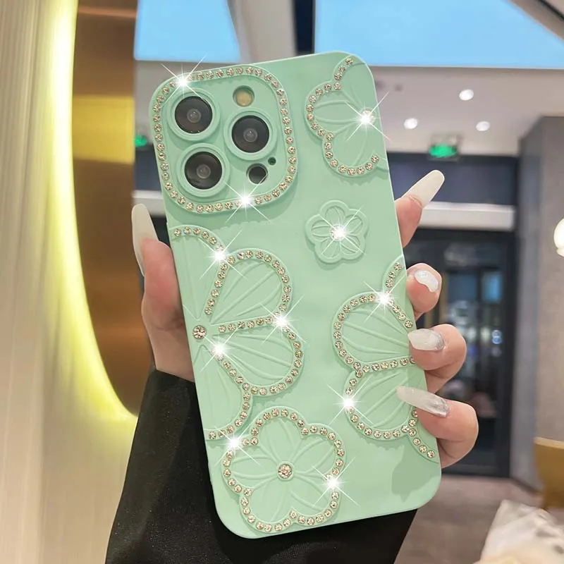 thumbnail image 1 of Funda transparente con diseño de flores y diamantes con baño de purpurina para iPhone 16, 15 Pro Max, 14, 13, 12 y 11, funda de silicona suave a prueba de golpes con brillantes diamantes de imitación, 1 of 5