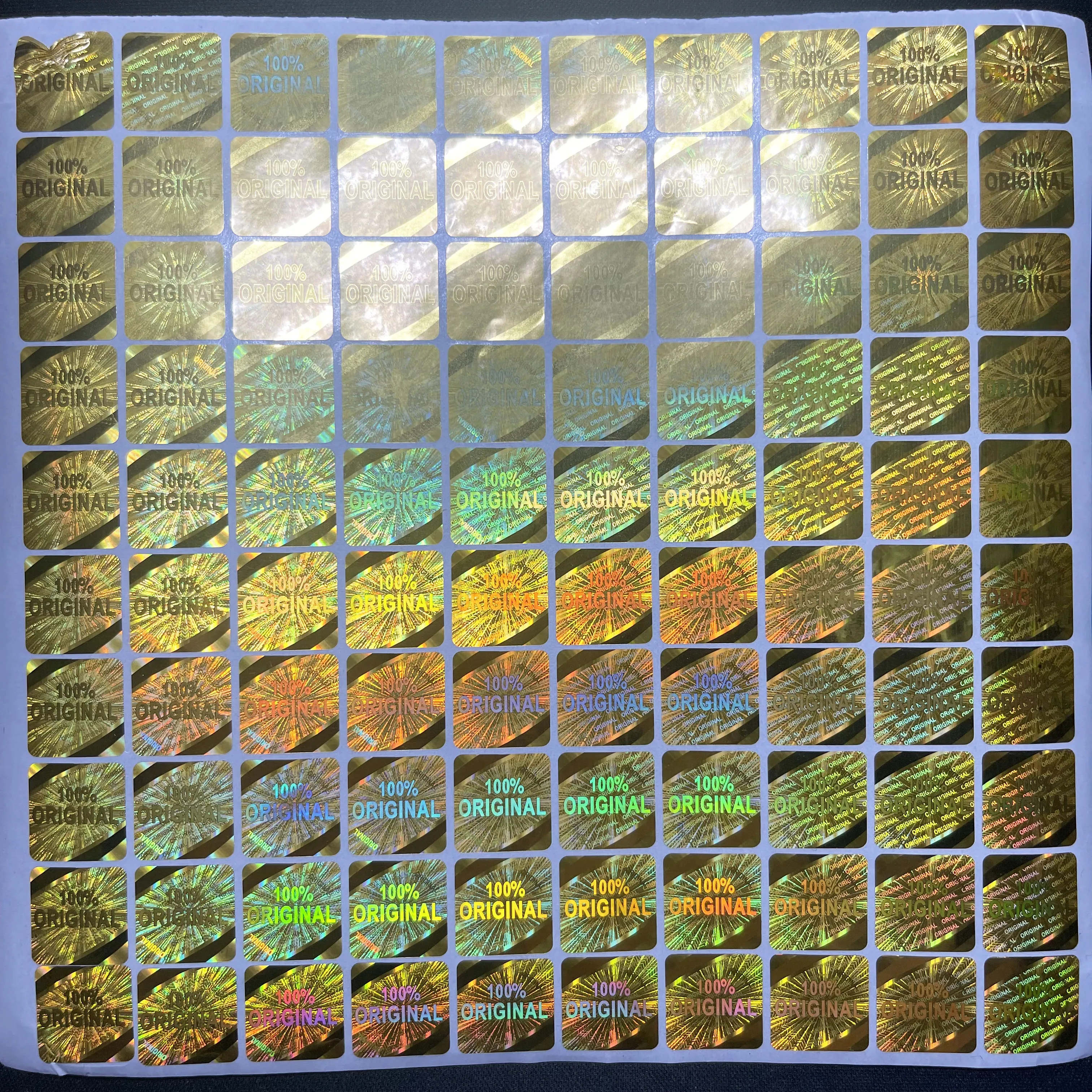 

100pcs 15x15mm Gold 100% Original Authentic Holographic Sticker Anti-Counterfeiting Warranty Security Stamp 3D Laser Sticker
