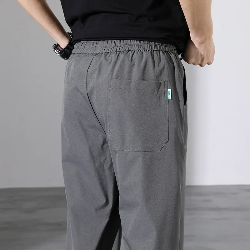 Spring and Autumn Men's Elastic High Waist Solid Pocket Drawstring Harlan Casual Sports Shrink Trousers Office Lady Pants