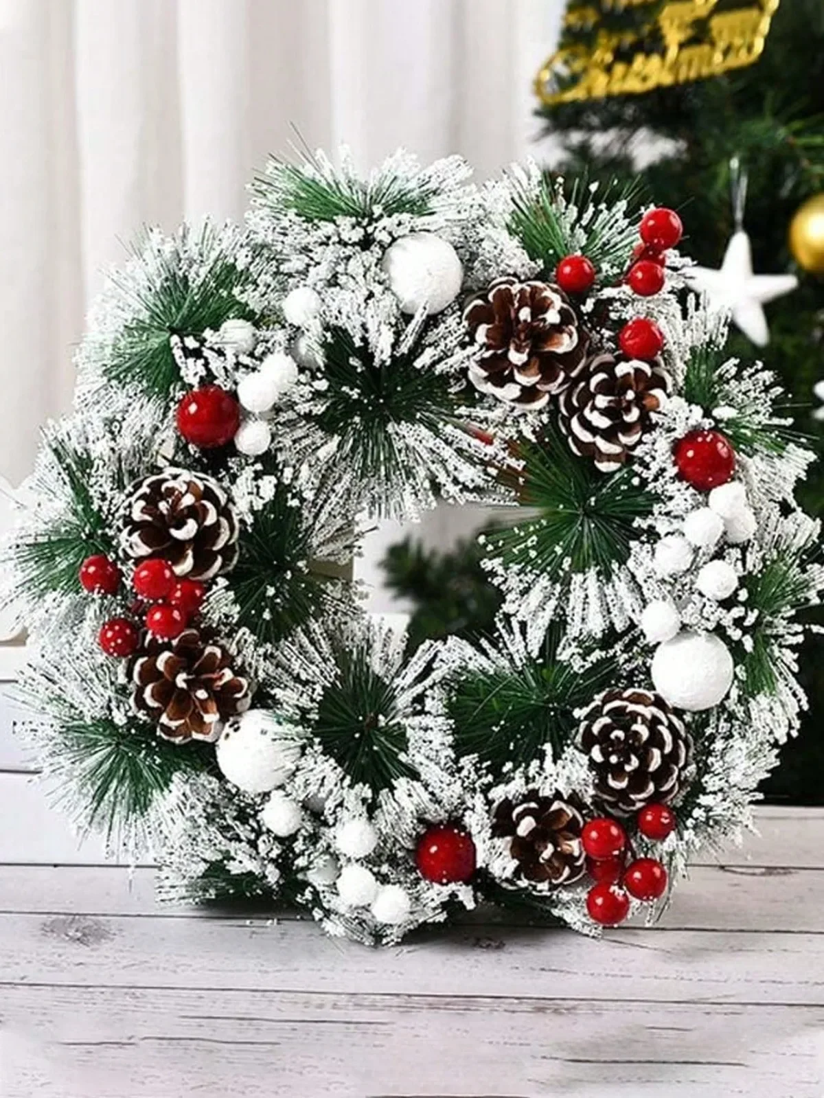 Julkrans för ytterdörr med kottar och snöflingor_voghion.com