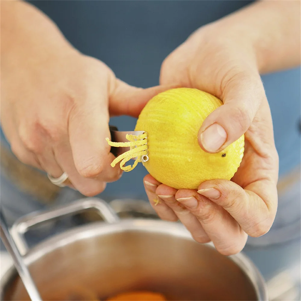 https://ae01.alicdn.com/kf/Se263952fcf52459d89a6f5385aeae6d97/Stainless-Steel-Lemon-Zester-Grater-Kitchen-Gadgets-Citrus-Fruit-Grater-Vegetables-Fruit-Peeler-Kitchen-Peeler-Tool.jpg