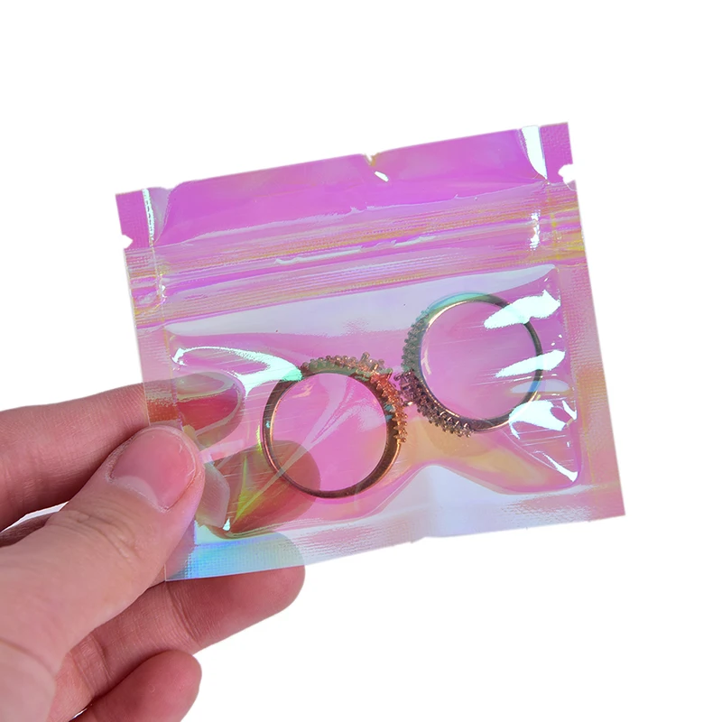 100Pcs Cosmetic Plastic Laser Zipper Reusable Zip Shut Bag Rainbow Transparent Symphony Ziplock Bag Iridescent Zip Lock Pouch