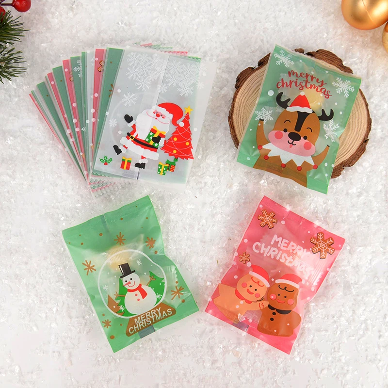 

100Pcs Merry Christmas Candy Bags Cartoon Santa Snowman Elk Baking Cookies Packaging Bag New Year Christmas Party Decor Supplies