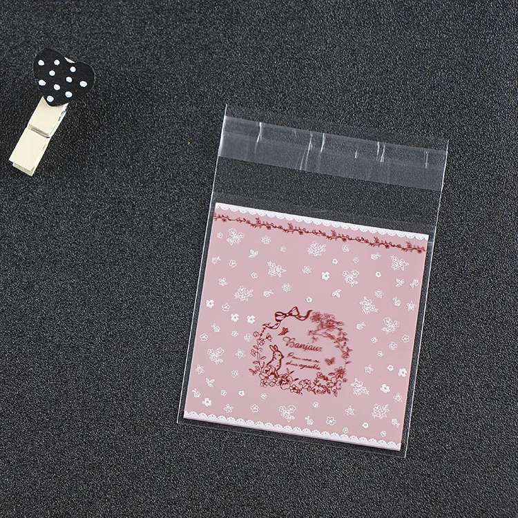 thumbnail image 1 of LBSISI Life, 7 x 7 + 3 cm, bolsas de galletas de caramelo, para turrón, boda, bolsa autoadhesiva, paquete de jabón de plástico pequeño de regalo de joyería, 100 piezas, 1 of 5