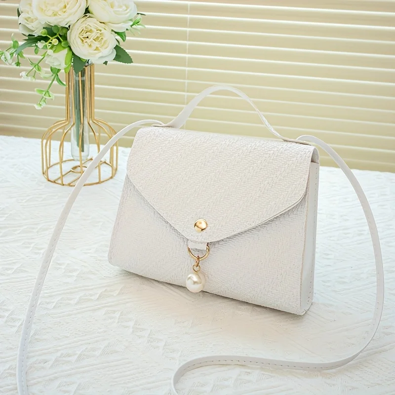 Borsa a tracolla da donna con perline e tracolla regolabile_voghion.com