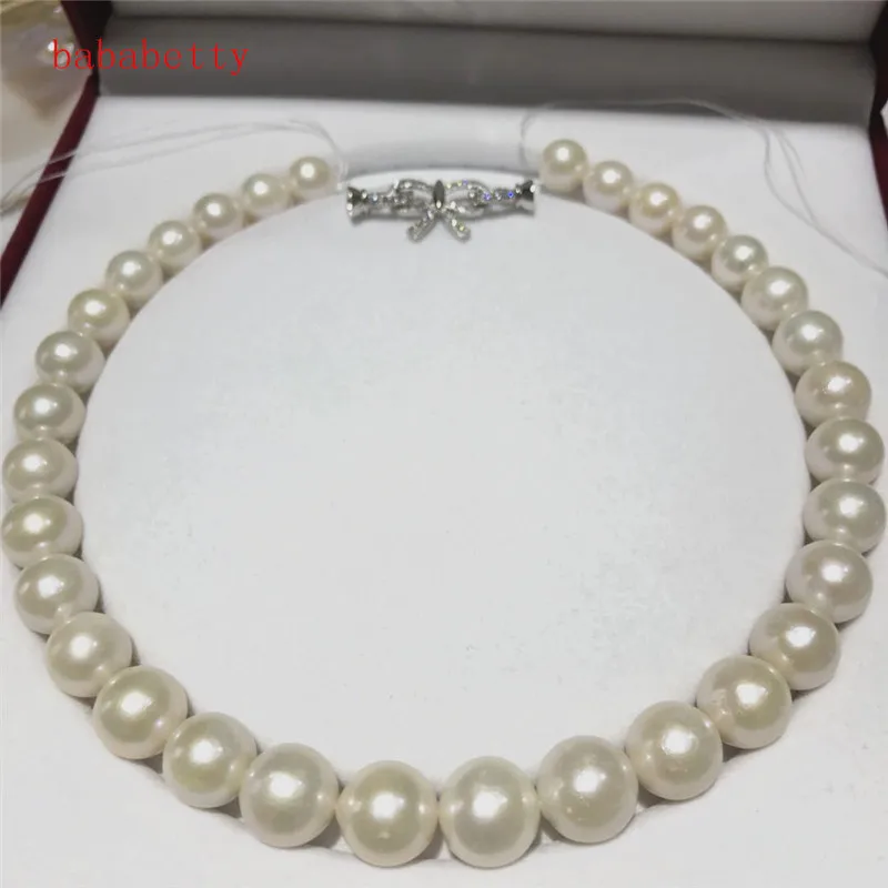 

luxury NEW Natural 12-15mm White pink Baroque Edison Freshwater Cultured Nuclear Pearl Beautiful necklace Bowknot is clasp 18"