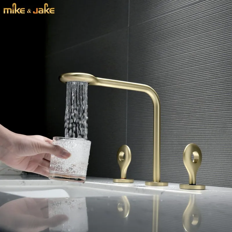 

Brush gold bathroom widespread basin mixer hot and cold double handle drop style water basin tap sink faucet gold basin crane