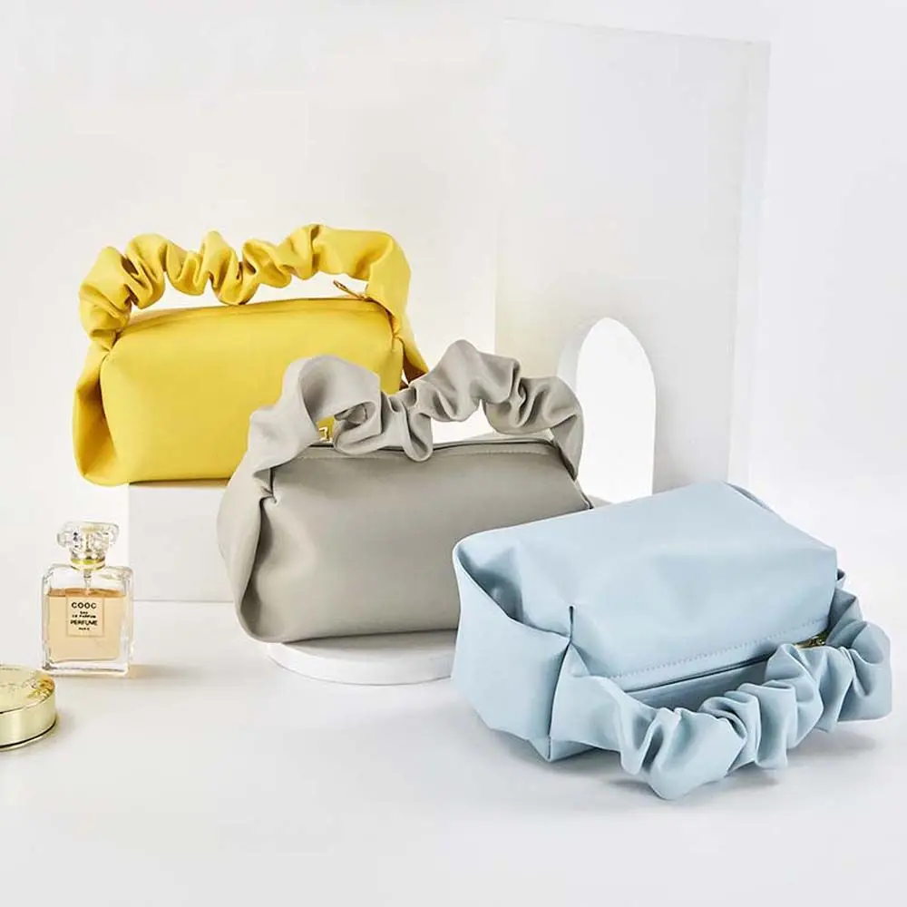 

Solid Color PU Leather Niche Texture Female Ins Style Cosmetic Bag Pleated Pocket Women Handbag Cloud Bag