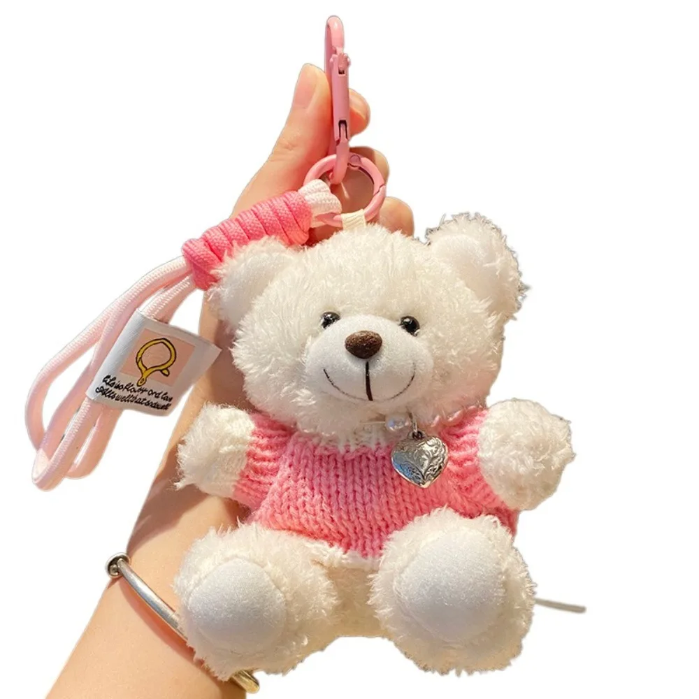 pink-clothing bear