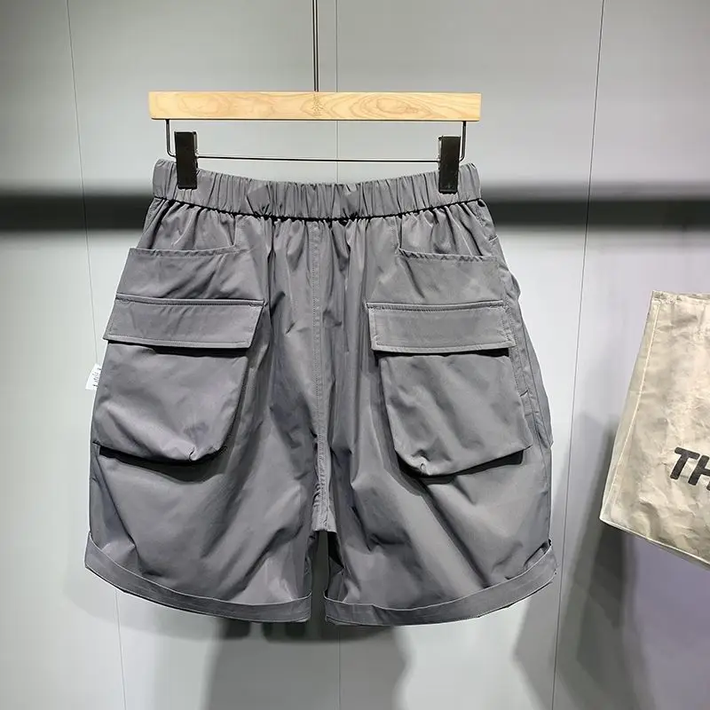 Summer New Solid Color Fashion Loose Knee Length Shorts Man Korean Style Elastic Waist Pockets Zipper Thin Style Straight Pants