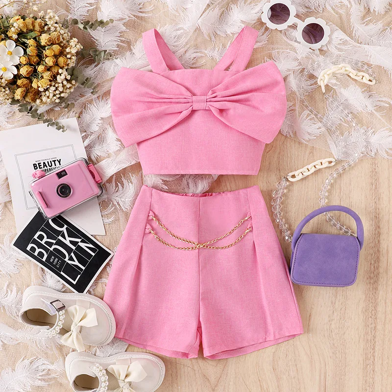 

Childrens Sets Europe America Spring Summer New Girls Sling Backstraps Bow Knot Tops Solid Color Shorts Two Piece 2024