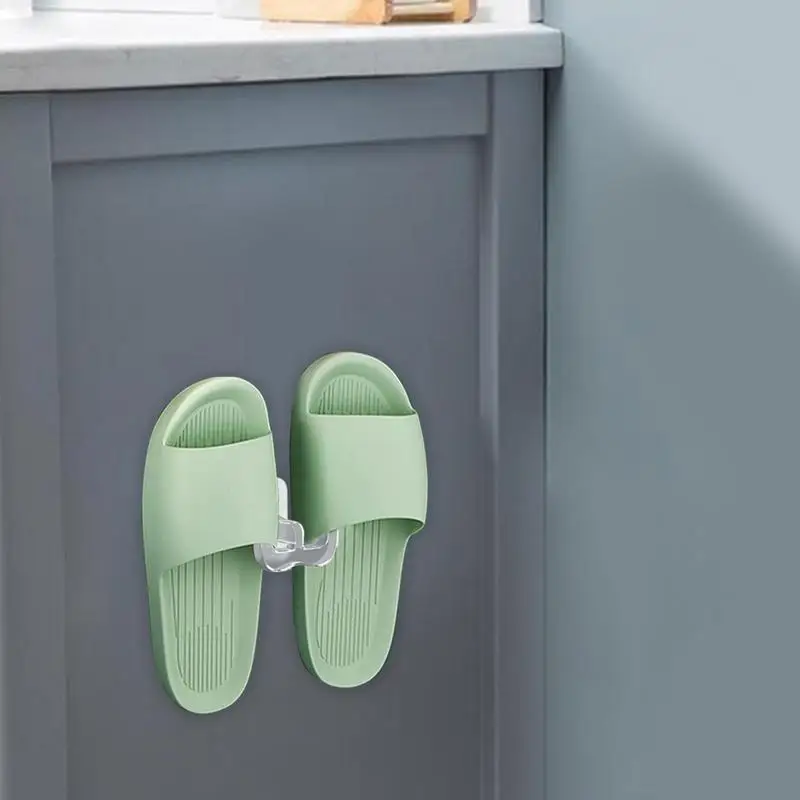 https://ae01.alicdn.com/kf/Se2fa2f4ab4f64477977cefc7e3884755Y/Shoes-Holder-For-Wall-Self-Adhesive-Bathroom-Simple-Punch-Free-Slipper-Hook-Shoe-Drying-Rack-Wall.jpg