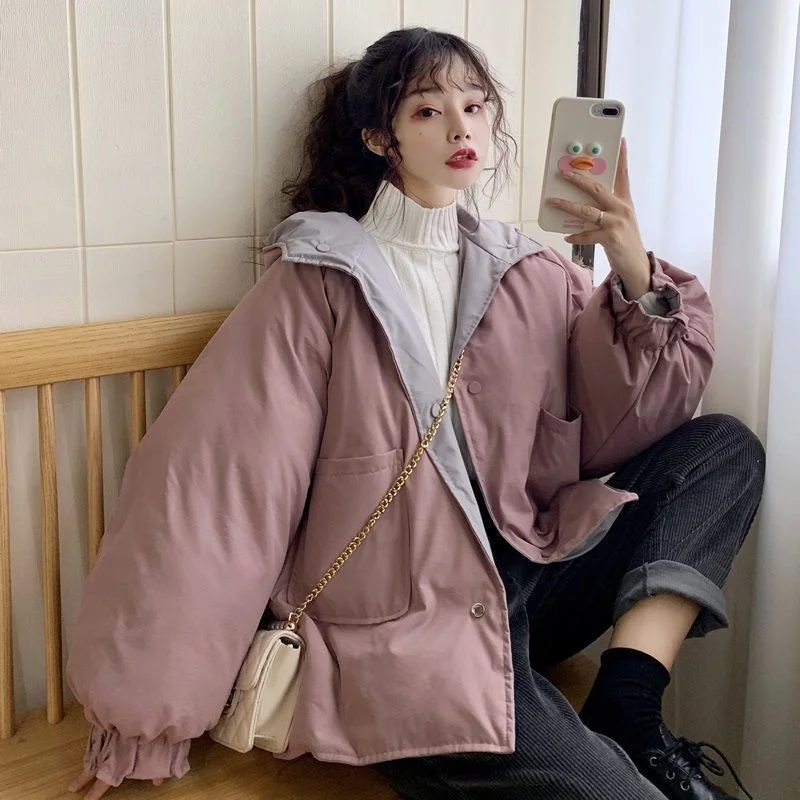 

Autumn and winter design sense, with a small number wearing oversize cotton jacket on both sides. Women's trend is loose and