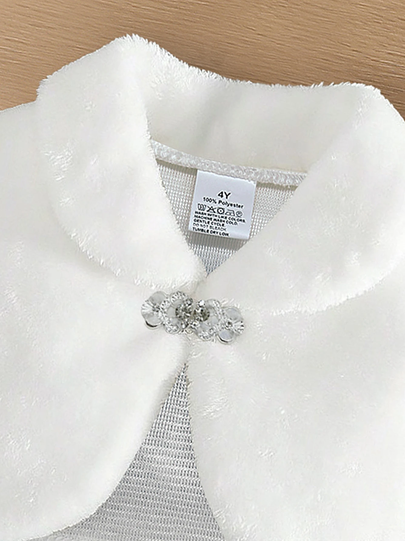 Jacket on hanger showing full design