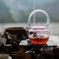 Bouilloire en verre au design original, résistante aux hautes températures, pour usage domestique, compatible avec les plaques chauffantes électriques en céramique 2