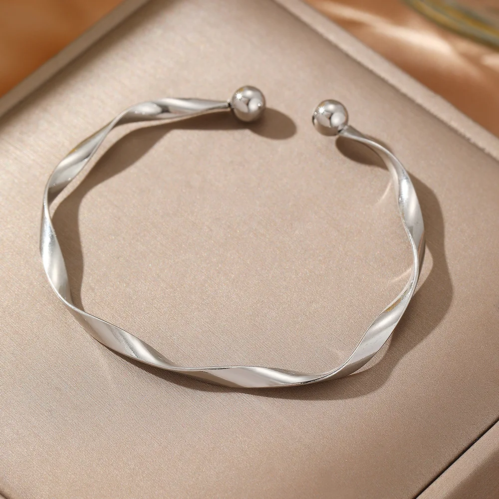 Elegant Sterling Silver Double Layer Bracelet with Irregular Knot Design
