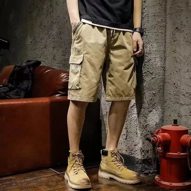 thumbnail image 1 of Pantalones cortos cargo para hombre por encima de la rodilla, cintura elástica sólida, pantalones cortos para hombre, pantalones cortos holgados estilo Harajuku, pantalones cortos grandes y altos, pan, 1 of 5