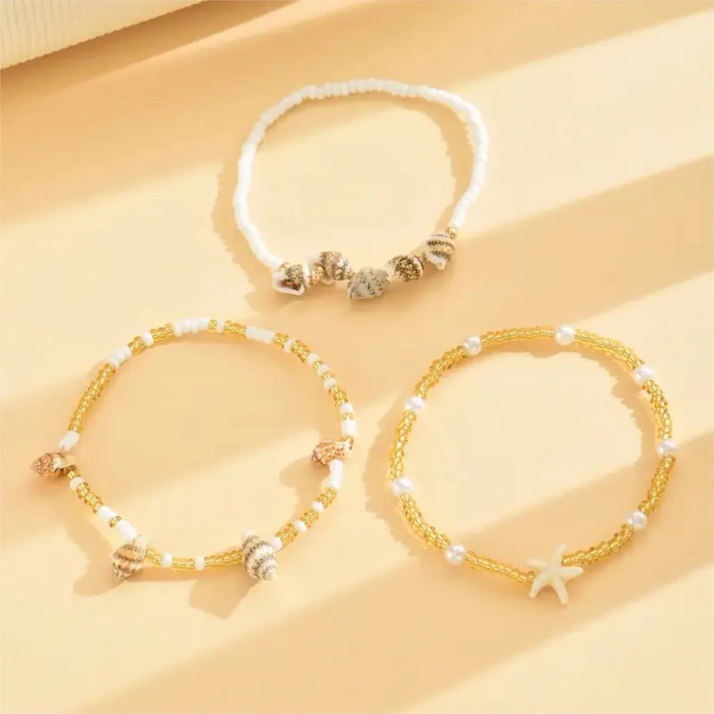 3 Pack Bohemian Layered Anklet for Women Golden-Tone Seashell&Starfish Charm Foot Jewelry Ideal for Beach Hawaiian Vacations