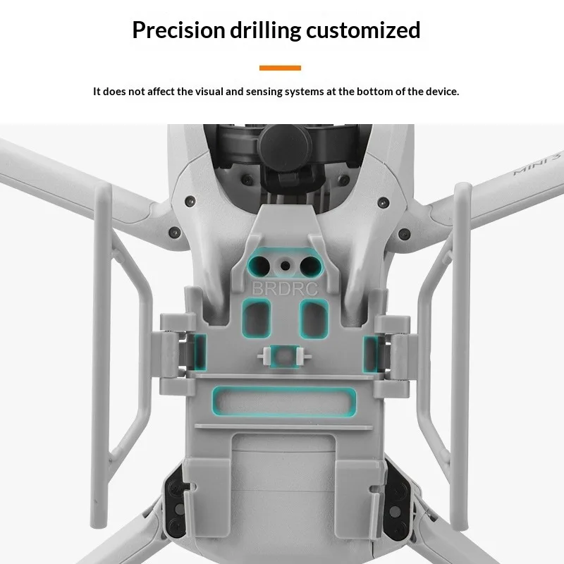 Train d'atterrissage pliable pour DJI Mini 3 et Mini 3 Pro, fixé sous un drone avec vis.