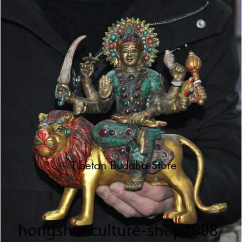 

Ancient Tibet bronze painted Turquoise gem sit lion 8 arm Kwan-yin Buddha statue