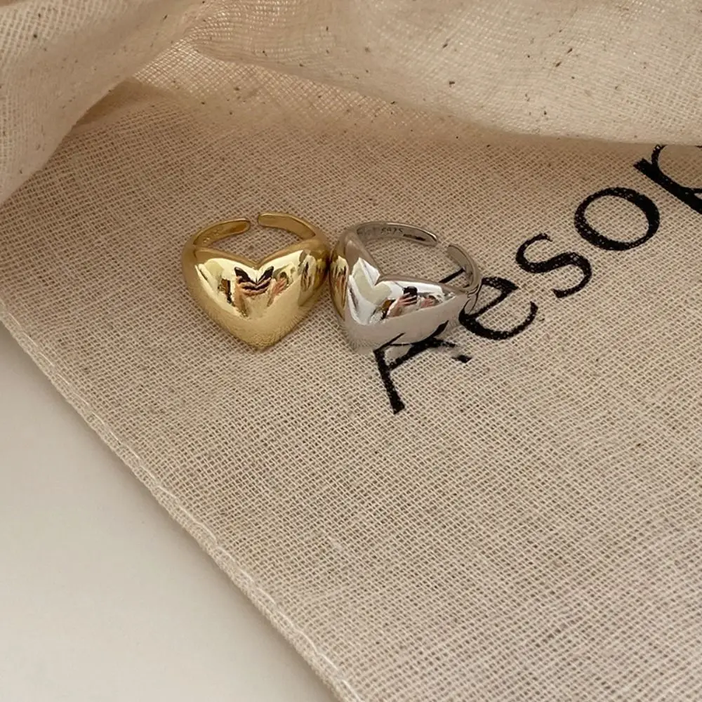 Stile di moda 2025, anello alla moda a forma di cuore in metallo liscio da donna, design semplice Y2K, regalo di coppia, gioielli, accessori_voghion.com
