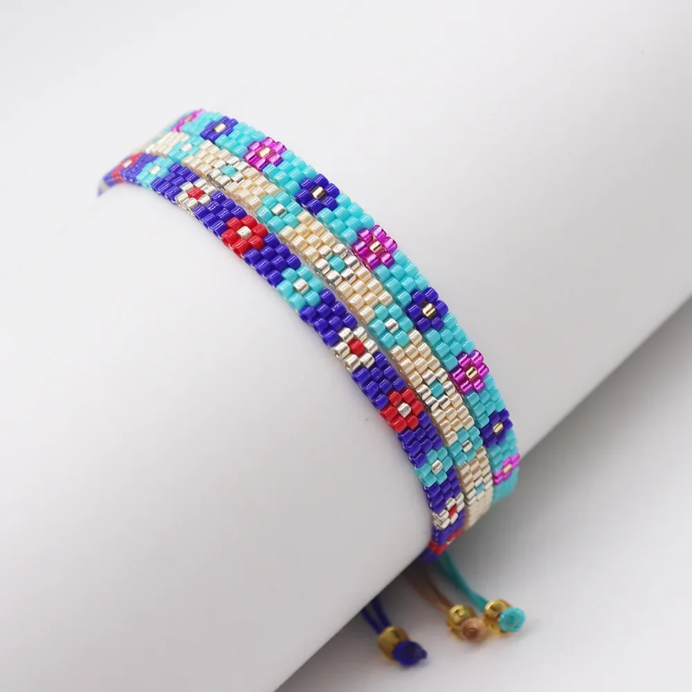 

Beaded bracelet Small flower pattern Hand weaving Bohemia Adjustable Fashion Simplicity Color Rice bead bracelet