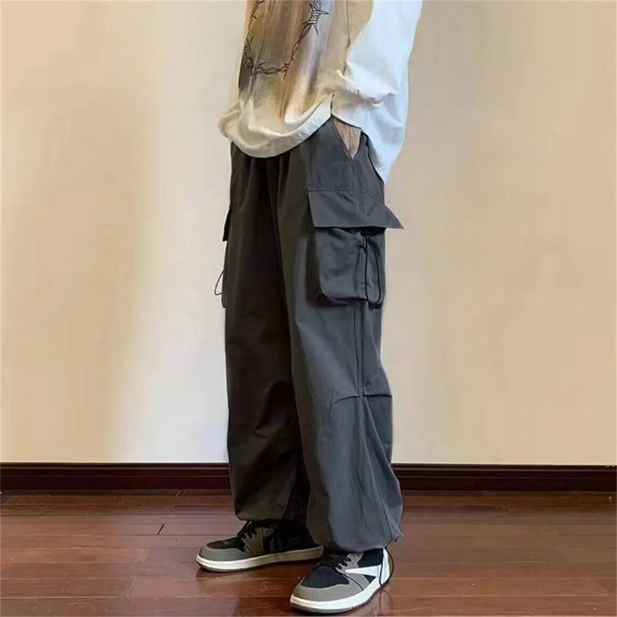 Streetwear 2024 Spring Harem Casual Pants Men Elastic Waist Solid Color Cargo Pants Multi Pocket Loose Baggy Pants For Women 3