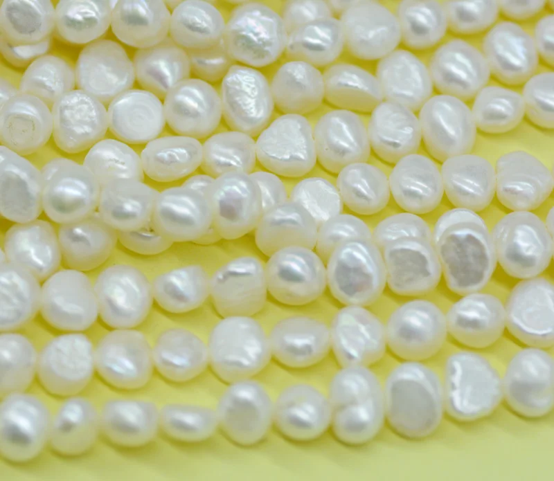 

10PCS 6-7MM AAA 100% natural freshwater baroque pearl. Loose beads 15"