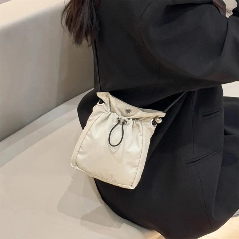 รูปสินค้า กระเป๋าสะพายข้างไนลอนแคนวาส ใส่ของได้หลากหลาย
