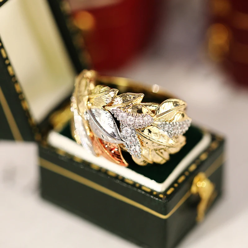 Huitan Three-tone Leaf Design Finger Rings for Women Inlaid Dazzling Cubic Zirconia New Fashion Wedding Band Luxury Lady Jewelry Se3bc620cf7c644ad94590a65bb201ea6P