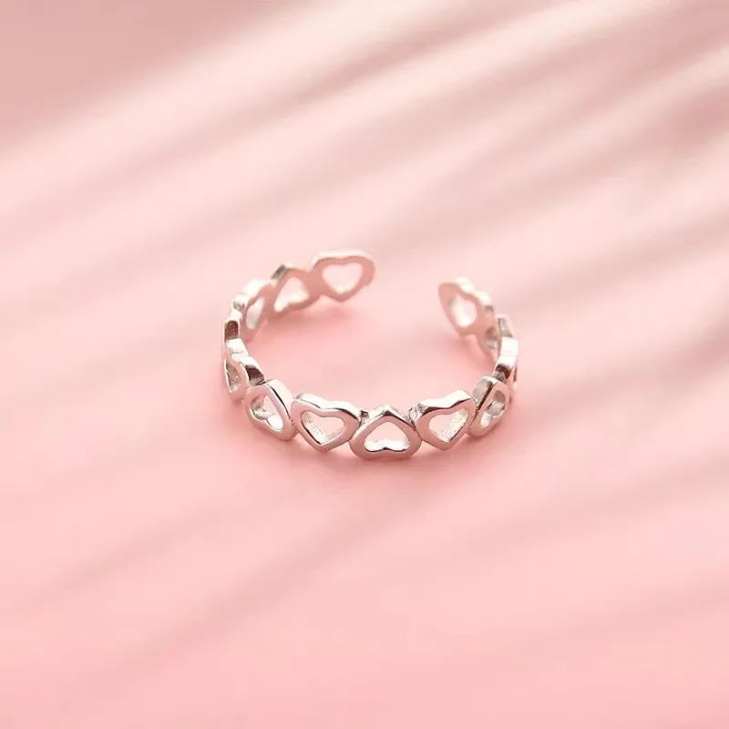 Neuer beliebter Schmuck aus 925er-Sterlingsilber, feine kleine, frische Mode, einfache herzförmige Liebe, hohle Öffnungsringe R033 – Detail 3