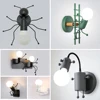Modern LED  Wall Lamp Nordic Cartoon Doll Wall Lights  American Creative Metal Robot Sconce for Kids Baby Room Living Bedroom 1