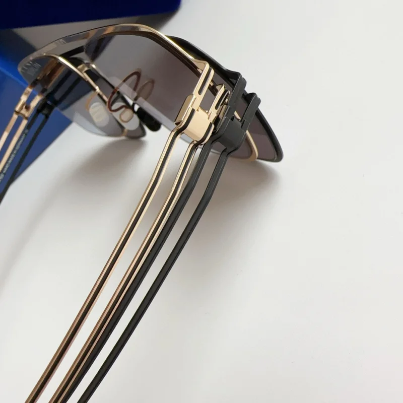 Deutschland Marke Design Schraubenlose Sonnenbrille Titan Ultraleicht Platz Mode Männer Sonnenbrille Große RIKU Gläser Auge Hohe Qualität – Detail 11