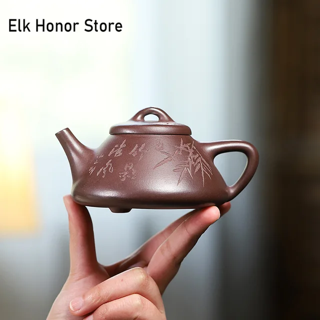 Yixing tea pot: A traditional Chinese teapot known for its heat retention and ability to enhance the flavor of tea.