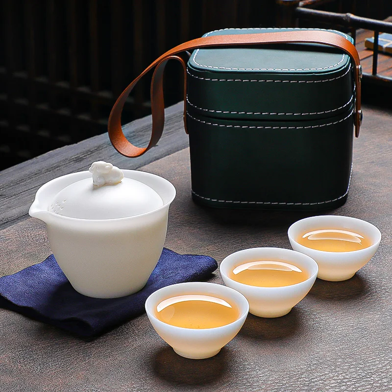 

GD53 Ice Sheep Fat Jade Porcelain Outdoor Portable Travel Tea Set, Quick Cup, One Pot, Three Cups Gift Set