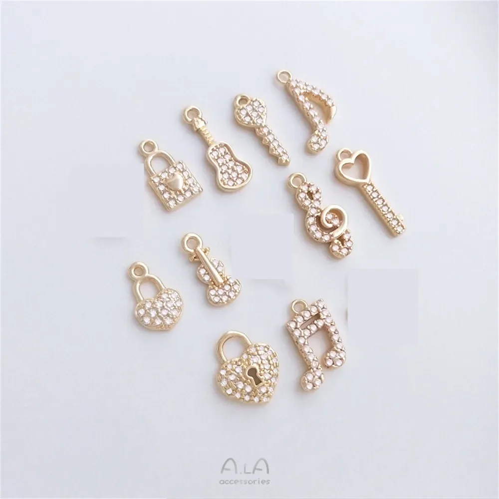 

Подвеска в форме скрипки, 14K