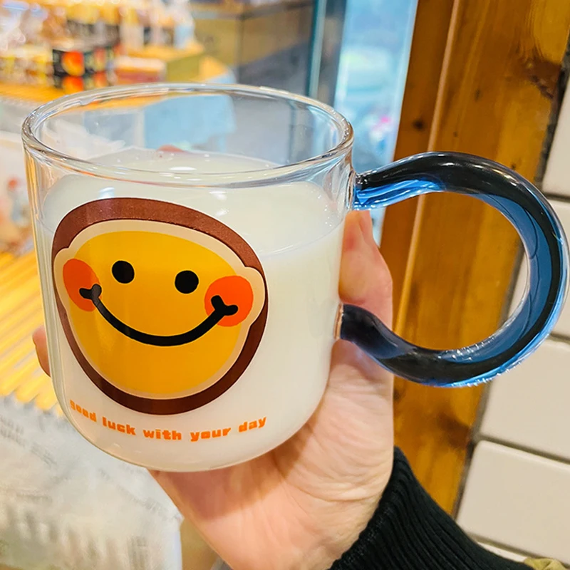 https://ae01.alicdn.com/kf/Se3eed9a8d8f849128b480c43b665c5afv/Cute-Girl-New-Smiley-Face-Mug-Home-Breakfast-Milk-Cup-with-Handle-with-Spoon-with-Lid.jpg