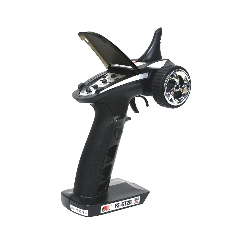 Détail des boutons et de la molette de la radiocommande GT2B 3 canaux 2.4GHz pour réglages précis.