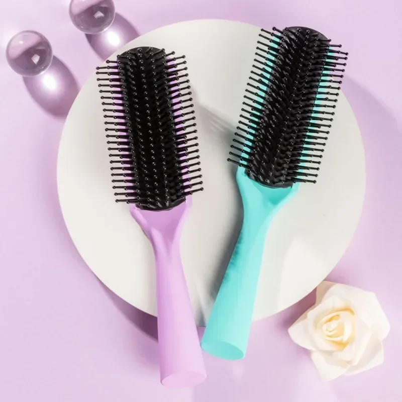 

Factory Direct Sales Anti-static Nine Row Comb Hairdressing Massage Rib Cute Button Shaped Roller Wholesale